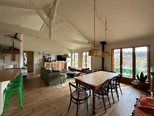 Chaleur et nature pour cette charmante maison ossature bois