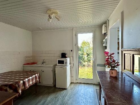 Maison à usage commercial et habitation