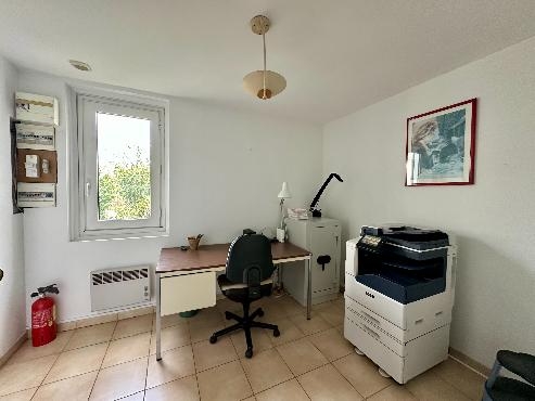 Maison à usage commercial et habitation