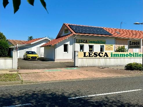 Maison à usage commercial et habitation