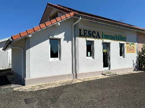 Maison à usage commercial et habitation