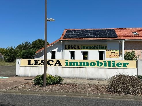 Maison à usage commercial et habitation